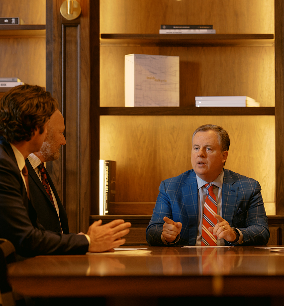 QII CEO Chad Williams with QII executives